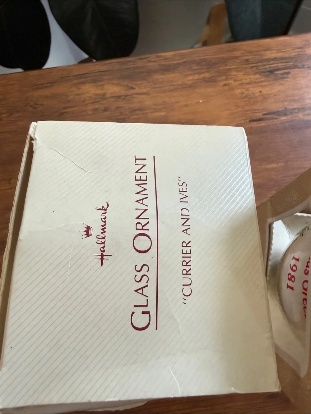 Hallmark Keepsake Ornaments in Red and Cream Boxes